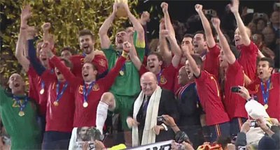 Spanish players lifting the trophy
